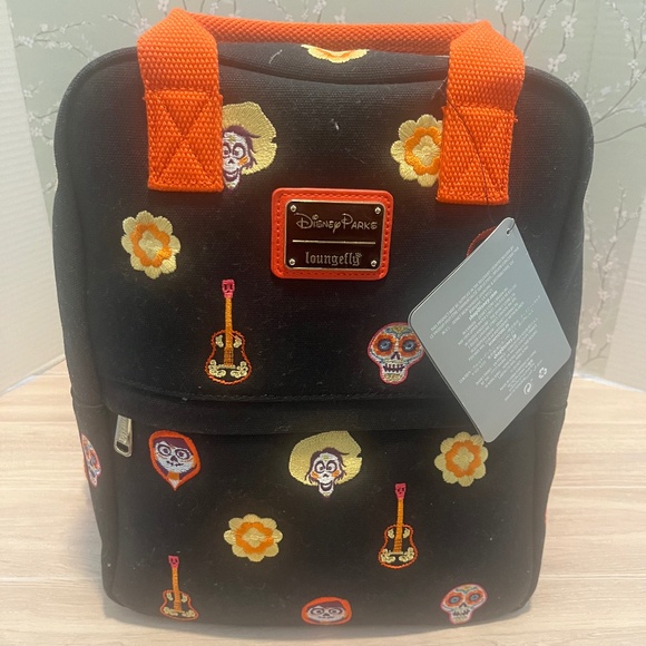 NWT Loungefly Disney Parks Pixar Coco Loungefly Canvas Mini Backpack - Picture 1 of 5